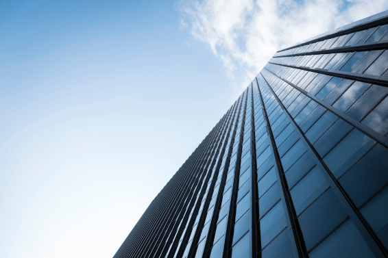 corporate buildings in the city against blue sky